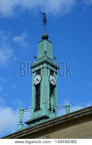 A view of an elaborate clock tower on a rooftop in Kirkcaldy