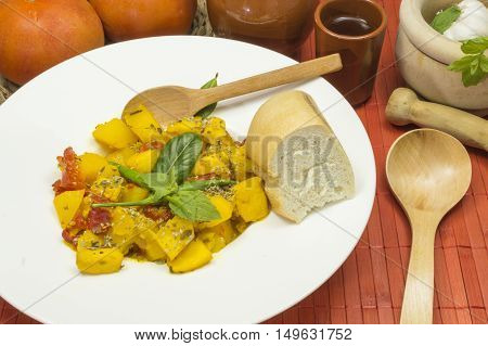 otatoes stew with cuttlefish on the table