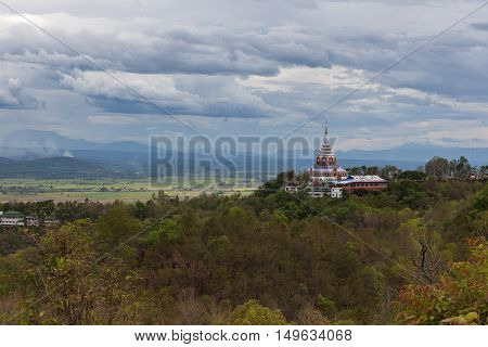 Top Of The Brightly Colored Pagoda View In Natural Environment On A Hilltop In A Forest At Twilight
