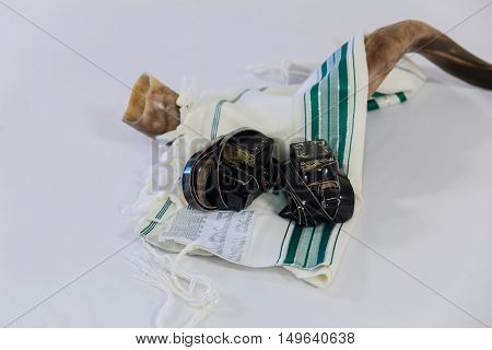 shofar horn on white prayer talit. room for text. rosh hashanah jewish holiday concept . traditional holiday symbol.