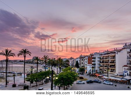 Sitges, Spain - June 10: View With Spain Beach, Buildings And Promenade Area On June 6, 2016 In Sitg