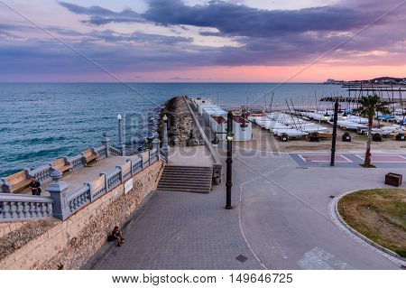 Sitges, Spain - June 10: View With Spain Beach And Promenade Area On June 6, 2016 In Sitges, Spain.