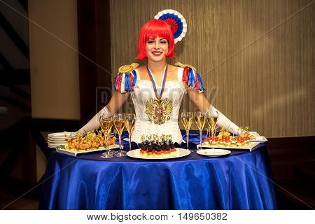 Moscow, Russia - September 18, 2016: Charming Lady Buffet, Who Dress Is Stylized Russian National Co