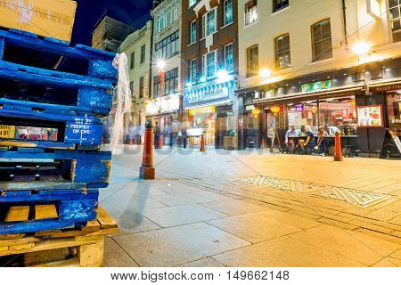 LONDON - SEPTEMBER 08: Night view of Chinatown in London a famous travel destination for visitors where many people come to eat chinese food at night on September 8th 2016 in London