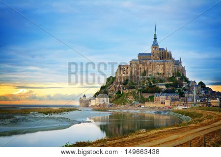 Mont St Michel city at sunset, Brittany France, toned