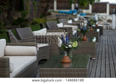 wedding decor on tables flowers blue and violet