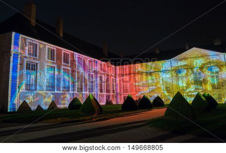 The Fine Arts museum of Chartres illuminated during Light scenographic show. Colorful light illumine historic places and some principal buildings throughout the event.