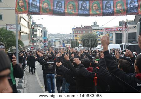Istanbul Turkey - November 3 2014: Universal Ashura Mourning Ceremony. Day of Ashura. A Universal Ashura Mourn Ceremony was held in Istanbul to commemorate the martyrdom of Husain ibn Ali the grandson of the Prophet Muhammad and his 71 friends.