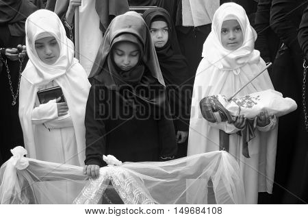 Istanbul Turkey - November 3 2014: Universal Ashura Mourning Ceremony. Day of Ashura. A Universal Ashura Mourn Ceremony was held in Istanbul to commemorate the martyrdom of Husain ibn Ali the grandson of the Prophet Muhammad and his 71 friends.