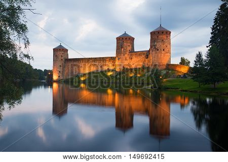 View of the fortress Olafsborg in the summer twilight. Savonlinna, Finland