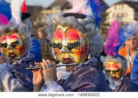 Basel, Switzerland - March 10, 2014: The tradtional carnival parade with dressed up people