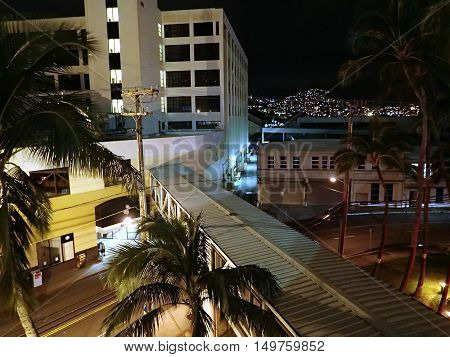 HONOLULU HI - JANUARY 1 2016: Aerial view of The Dole Cannery building at night on island of Oahu in the state of Hawaii. Formerly a canning complex it is now an office and retail complex that offers specialty shops superstores entertainment eateries and