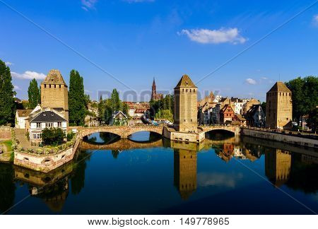 Old Historical Center Of Strasbourg. Fortress Towers And Briges In Little France With Reflection In