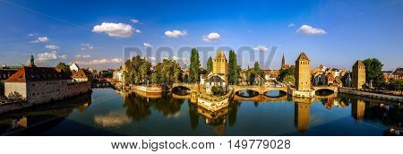 Old Historical Center Of Strasbourg. Fortress Towers And Briges In Little France With Reflection In