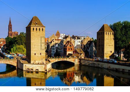 Old Historical Center Of Strasbourg. Fortress Towers And Briges In Little France With Reflection In