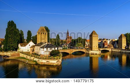 Old Historical Center Of Strasbourg. Fortress Towers And Briges In Little France With Reflection In
