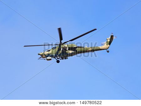 Perform flight by the modern russian attack helicopter Mi 28