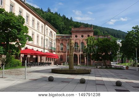 BAD WILDBAD GERMANY - JUNE 28 2015: the square Kurplatz Palais Thermal former Badhotel Baden-Wuerttemberg Schwarzwald Black Forest