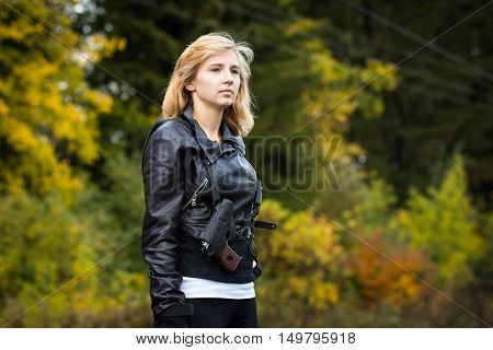 Nice Girl With Arms In Autumn Day