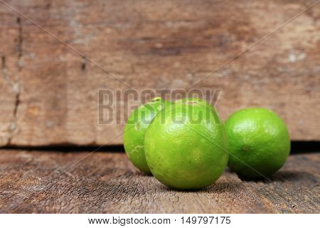 lime closeup Select focus with shallow depth of field on the wooden