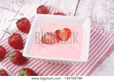 strawberry on a white color wooden background