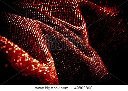 draped lurex fabric - warm red orange color space - dark background