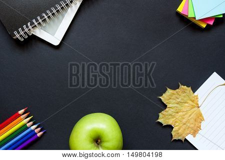Stationery On The School Black Desk