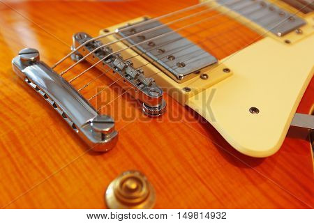 Closeup of the solid body electric guitar. Detail selective focus.