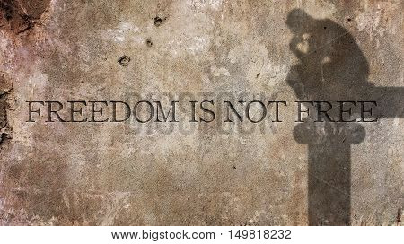Freedom is not Free. Written on Concrete Wall.