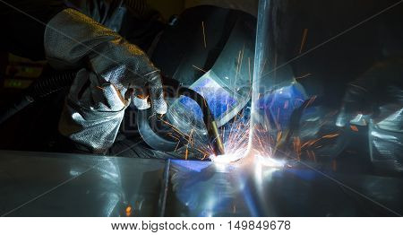 welder craftsman erecting technical steel Industrial steel welder in factory