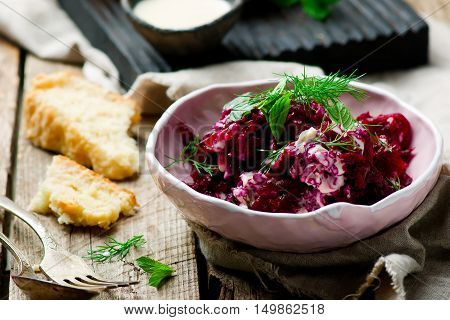 Beet salad with tahina sauce .selective focus