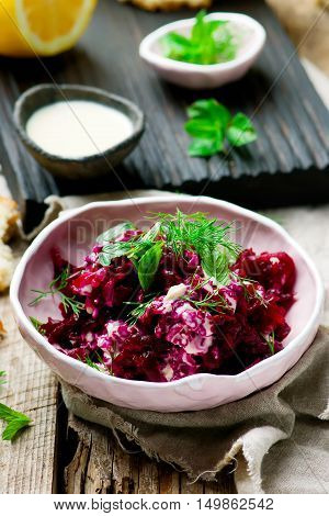 Beet salad with tahina sauce .selective focus