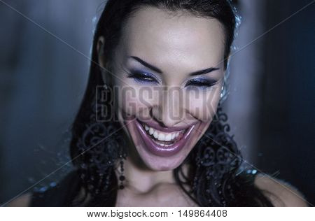 Sexy Emotional Beautiful Woman craftily (predatory) smiling. Red Smeared lipstick. Temptress Cheeky Youth. Beauty Face with sloppy makeup Sexy Sensual fatal Girl. Provocative crazy look