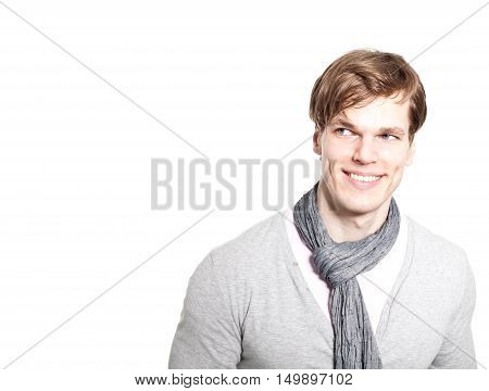 Young Man Looking At Copyspace Having A Satisfied Look, Isolated On A White Background..