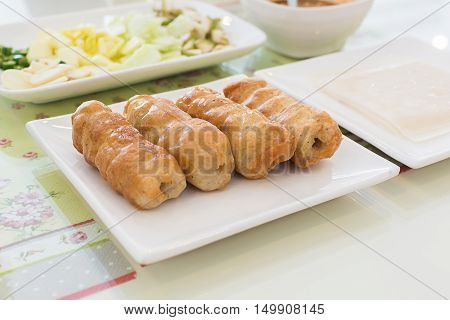 Grilled pork balls with condiments and Peanut Sauce Vietnam food