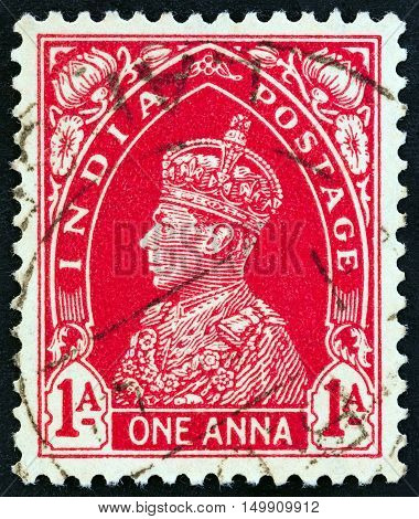 INDIA - CIRCA 1937: A stamp printed in India shows King George VI, circa 1937.