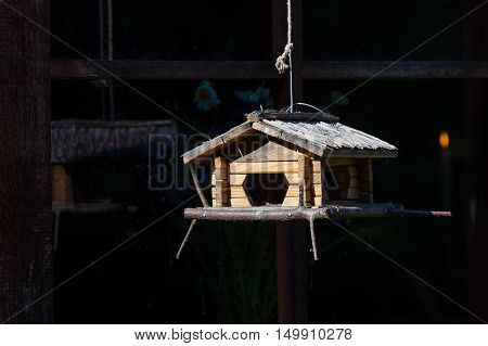 Handcrafted Log Cabin Birdhouse. Close-up