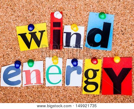 The Phrase Wind Energy In Cut Out Magazine Letters Pinned To A Cork Notice Board..