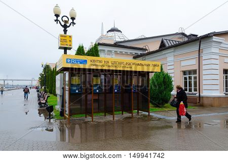 MOGILEV BELARUS - SEPTEMBER 29 2016: Unknown woman goes near self-service terminals 