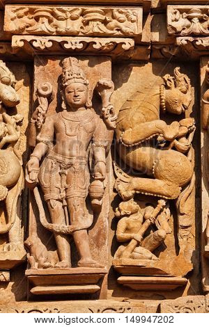 Stone carving bas relief sculptures on Adinath Jain Temple, Khajuraho, Madhya Pradesh, India