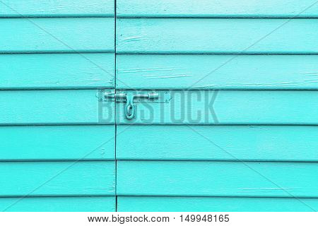 bolt the door on wall cyan. for use as a background.