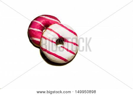 Two colored donuts in a white background