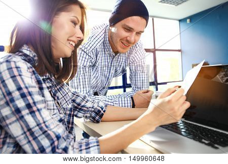 Coworkers Work Process Modern Office Loft.Young Professionals Making Great Decision New Creative Idea.Business Team Working Startup. Happy web designers brainstorming about new sartup