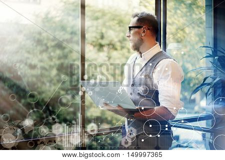 Concept Global Strategy Virtual Icon Diagram Graph Interface Investments Reserch.Bearded Businessman Searching Great Business Decisions.Young Man Holding Laptop Hands Looking Panoramic Window.Blurred
