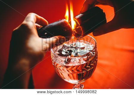 witch holds candle love spell on ritual