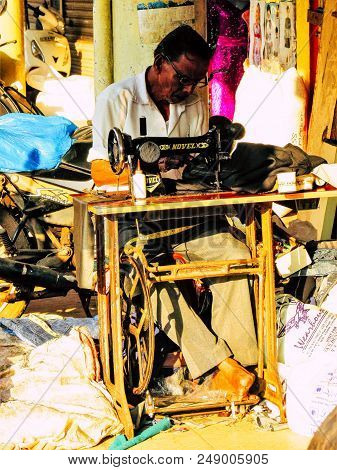 Margao Goa India December 20, 2017 View Of A Taillor Working In The Street Of Margao In The Morning