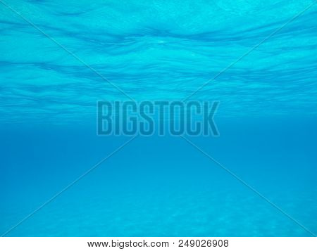 Underwater Photo Aquamarine Sea Water Of Simos Beach, Elafonisos Island, Peloponnese, Greece, June 2
