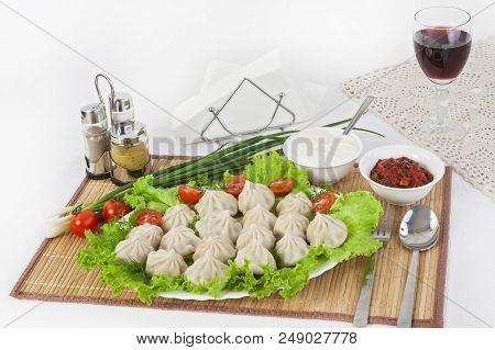 Kinkali In Green With Tomatoes And Onions. Serve With Soy Sauce And Sour Cream.