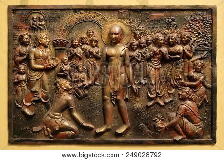 KOLKATA,INDIA - FEBRUARY 09,2016: Bhagavan Mahaviras waling tour is beset with pleasant and painful distractions, Street relief on the wall of Jain Temple in Kolkata, West Bengal, India.