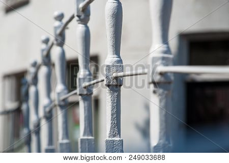 White Painted Decorative Wrought Iron Railing. Romantic Atmosphere Details Of Traditional Craftsmans